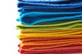 Pile of rainbow colored towels isolated Royalty Free Stock Photo