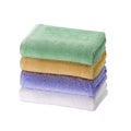 Pile of rainbow colored towels isolated Royalty Free Stock Photo