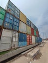 Pile of rainbow Containers at the port