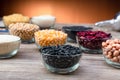 Pile of raw Black Beans in a bowl. black beans on wood background. Dry black beans in dark wooden bowl. Royalty Free Stock Photo