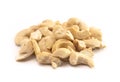 A Pile of Raw Natural Cashew Nut Pieces Isolated on a White Background