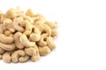 A Pile of Raw Natural Cashew Nuts Isolated on a White Background