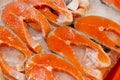 A pile of raw salmon fillets on ice Royalty Free Stock Photo