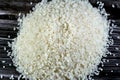 A pile of raw short grain white rice, White rice is milled rice that has had its husk, bran, and germ removed, seeds are with a