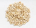 Pile of raw unpolished Sorghum grains on gray Royalty Free Stock Photo