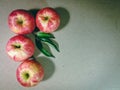 Pile of red apple, Assortment of exotic fruits isolated on grey background. Creative layout made of fresh fruits. Royalty Free Stock Photo