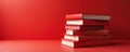 Pile of red books is stacked on table. Knowledge literature concept. Symbolizes studying, learning, reading and education. Stack Royalty Free Stock Photo