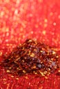 Pile of Red Chillies pepper on glitter backdrop Royalty Free Stock Photo