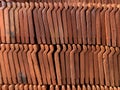 Pile of red clay tiles. Background of red tiles Royalty Free Stock Photo