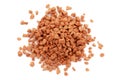 Pile of red mineral fertilizers on a white background, top view. Heap potassium chloride is isolated on a white background, top