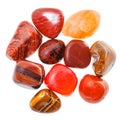 Pile of red and orange natural mineral gemstones