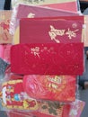 A pile of red packet containing gift of money packed inside given as token of good wishes during auspicious occasions