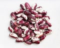 Pile of red speckled kidney beans close up on gray