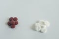 pile of red and white pills on blue background with copy space. medicine concept Royalty Free Stock Photo