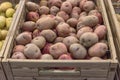 Pile of red and yellow potatoes variety in plastic crate at market stand in Houston, Texas, USA Royalty Free Stock Photo