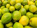 Pile of ripe green limes in a supermarket local market in Thailand, Royalty Free Stock Photo