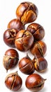 Pile of Roasted Chestnuts with Brown Shells on White Background Studio Shot Royalty Free Stock Photo