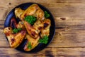 Pile of the roasted chicken wings on plate. Top view Royalty Free Stock Photo