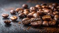Pile of roasted coffee beans with scattered coffee grounds on a dark textured surface with soft bokeh background Royalty Free Stock Photo