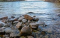 Pile of rocks in bay of lake Vattern Sweden Royalty Free Stock Photo
