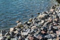 Pile of rocks on lakeside Royalty Free Stock Photo
