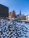 Pile of rocks under the snow. The House of the Blackheads. Riga, Latvia Royalty Free Stock Photo