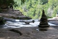 Pile of rocks by a waterfall Royalty Free Stock Photo