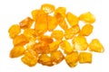 A pile of rough uncut yellow sapphires