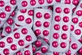 Pile of round pink tablets pill in blister pack. Pharmaceutical industry. Pharmacy products. Prescription drug. Painkiller Royalty Free Stock Photo