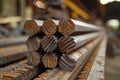 A pile of rusted steel bars in a factory