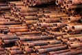 Pile of rusty metal pipes as industrial background Royalty Free Stock Photo