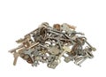 Pile of rusty silver keys on a white surface