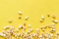 Pile salted and marinated peanuts isolated on a yellow background Royalty Free Stock Photo