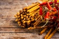 Pile of Salty bread sticks on a wooden table