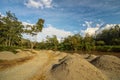 Pile of sand by the river Baliem Royalty Free Stock Photo