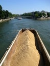The pile of sand on the Sena river Royalty Free Stock Photo