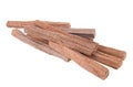 Pile of sandalwood sticks isolated on white background