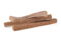 Pile of sandalwood sticks isolated on white background. Chandan or sandalwood