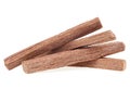 Pile of sandalwood sticks isolated on white background. Chandan