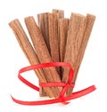 Pile of sandalwood sticks isolated on white background. Sandalwood pieces. Chandan