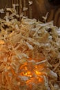 Pile of Sawdust with light from inside