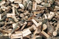 A pile of sawed firewood for heating in winter. Stockpile of firewood during the energy crisis