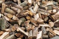 A pile of sawed firewood for heating in winter. Stockpile of firewood during the energy crisis