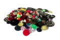 A pile of scattered multi-colored buttons.