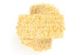 Pile of sesame brittle bars, sesame seed candy from above, over white