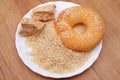 Pile sesame grains, halvah and donut