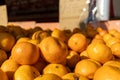 Pile of shiny oranges - market setting