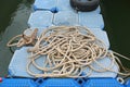 Pile of ship rope on floating pontoon