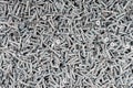 Pile of Silver Screws texture Background Pattern Royalty Free Stock Photo