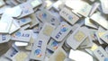 Pile of SIM cards with BT Group plc logo, close-up. Editorial telecommunication 3D rendering